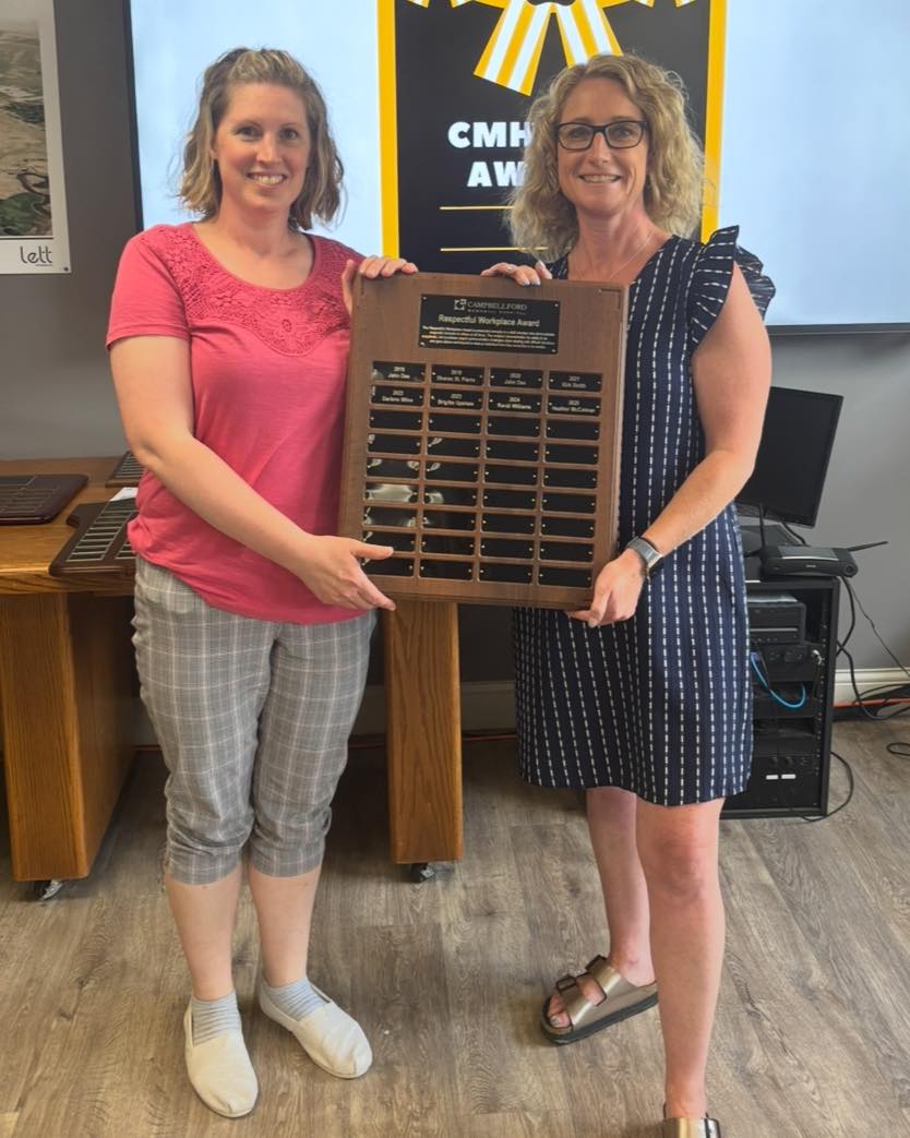 Heather McColman receiving award Heather McColman receiving award